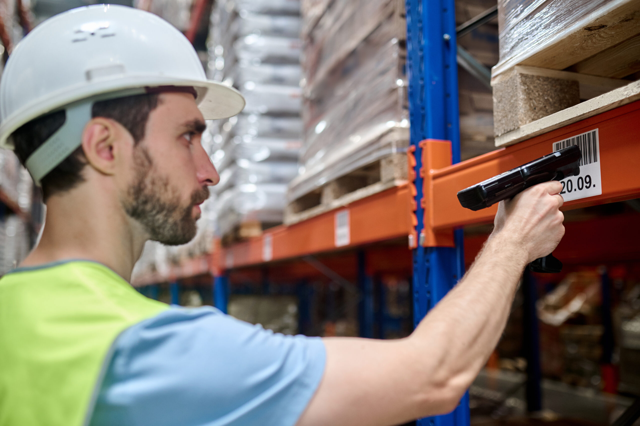 Warehouse, manager and box with stock, label and package for logistics and cargo export. Person, freight and inventory for shipping, ecommerce or wholesale supplier with courier inspection for retail